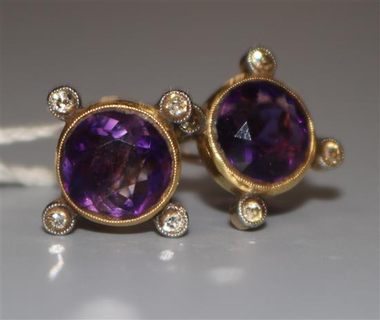 A pair of 9ct gold, amethyst and diamond ear clips.